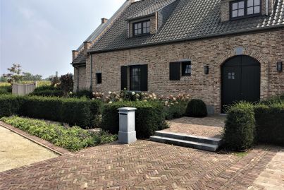 Inkom woning oud Hollandse klinker en natuursteen traptredes
